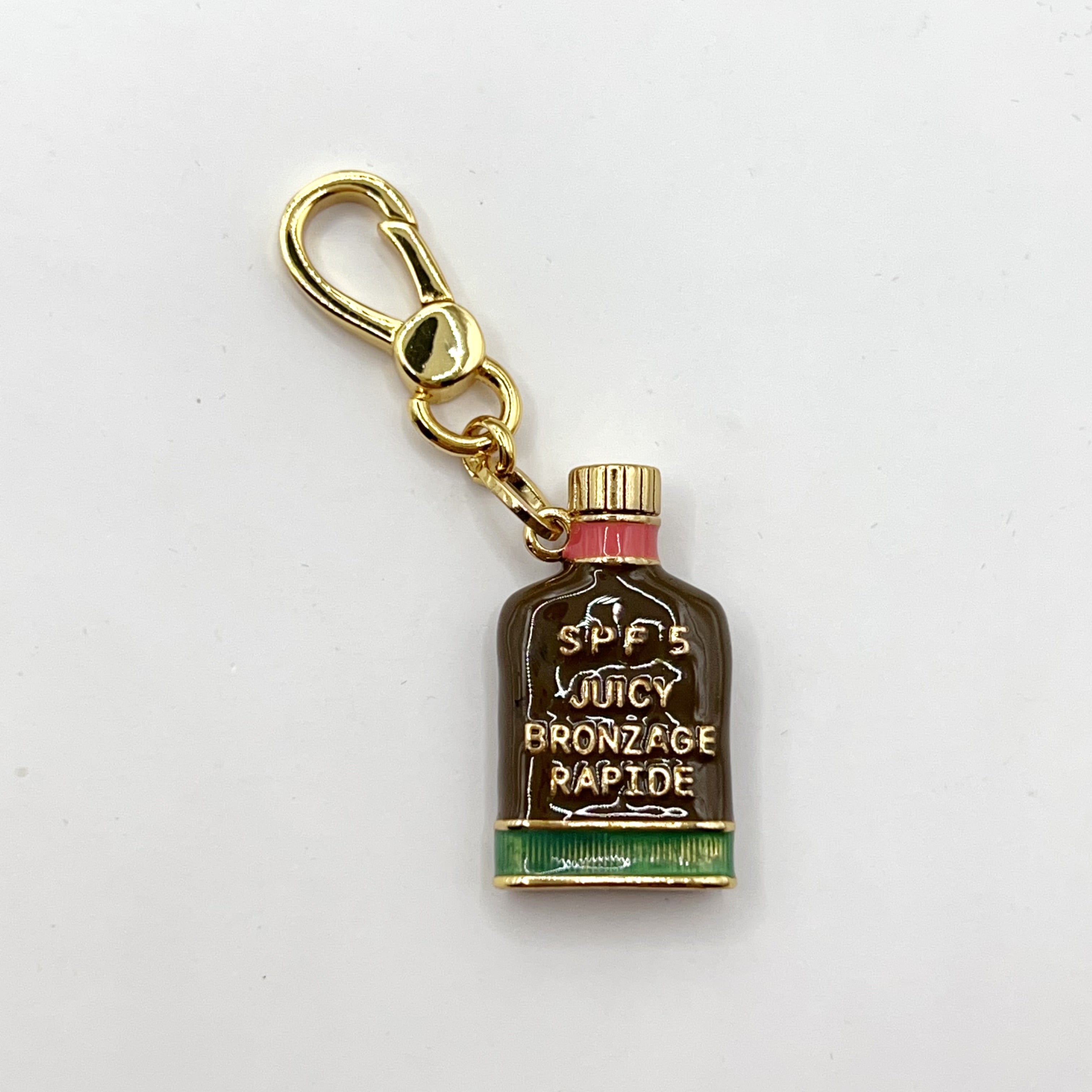 Y05-Juicy Couture suntan lotion charm