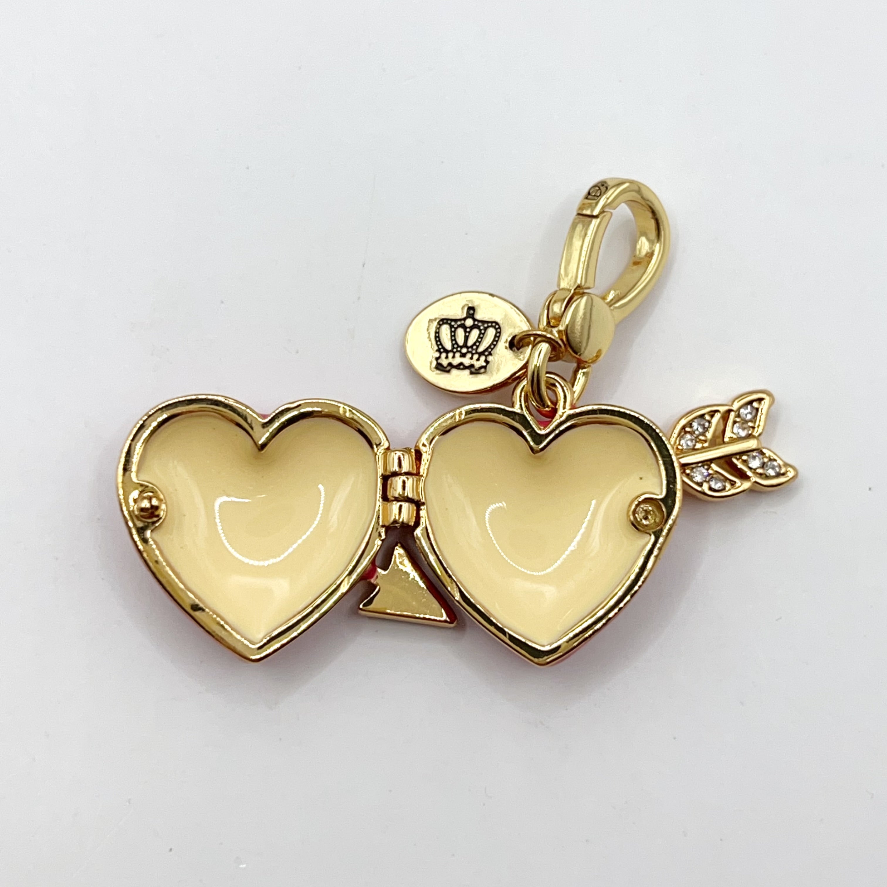 B08-Juicy Couture pink heart locket with arrow charm