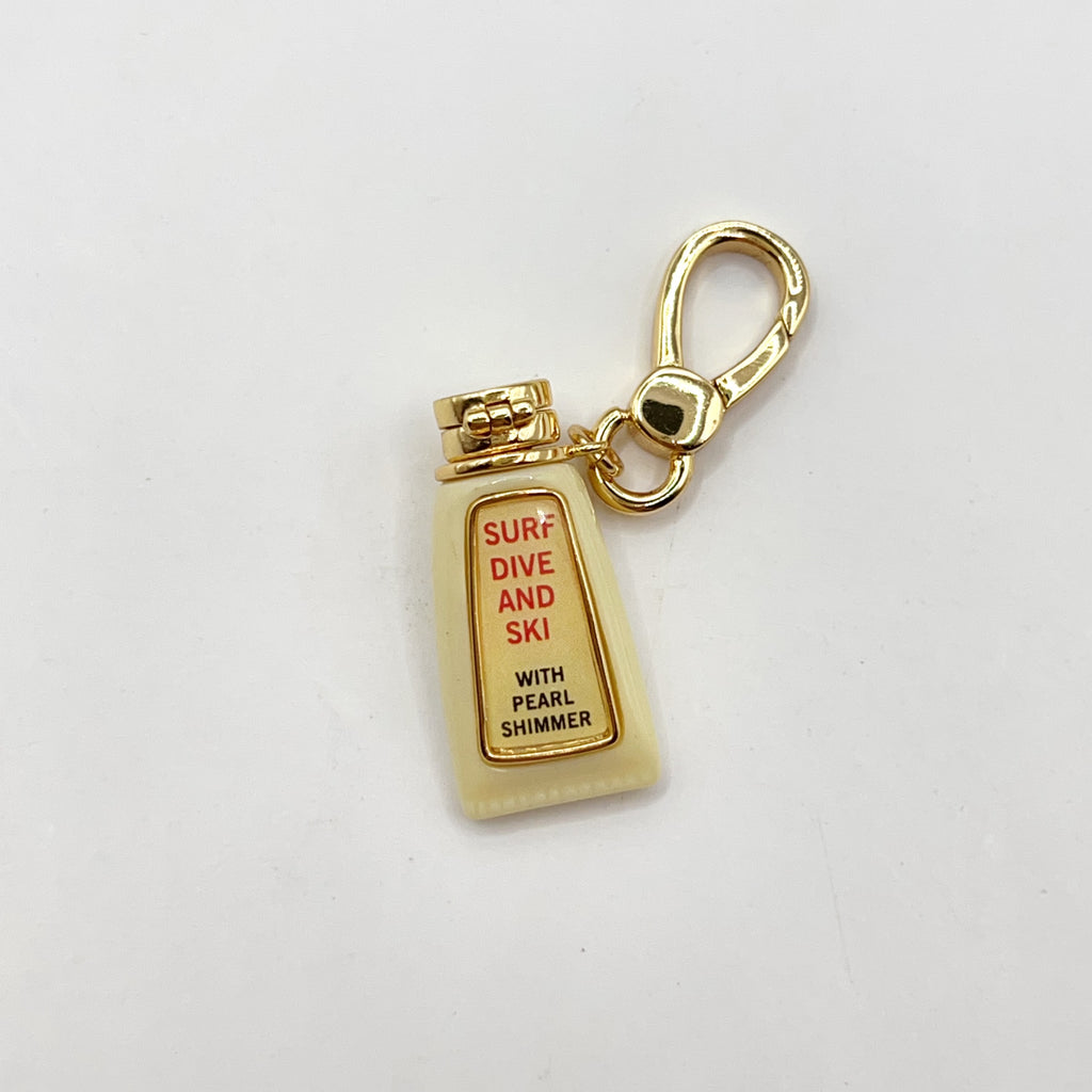 JC011-Juicy Couture tan oil charm