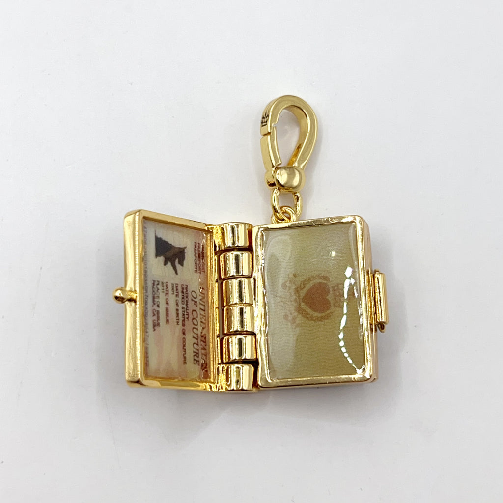 C03-Juicy Couture passport charm