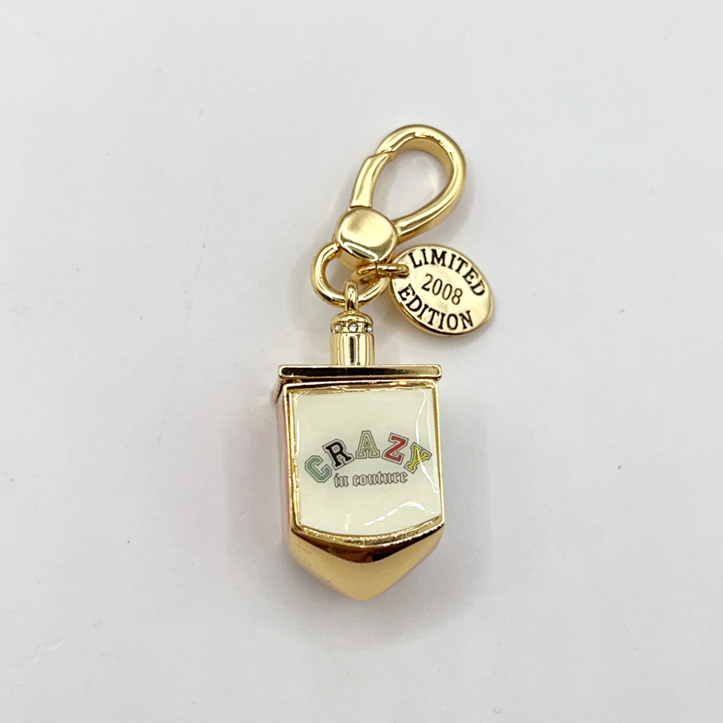R12-Juicy Couture dreidel charm