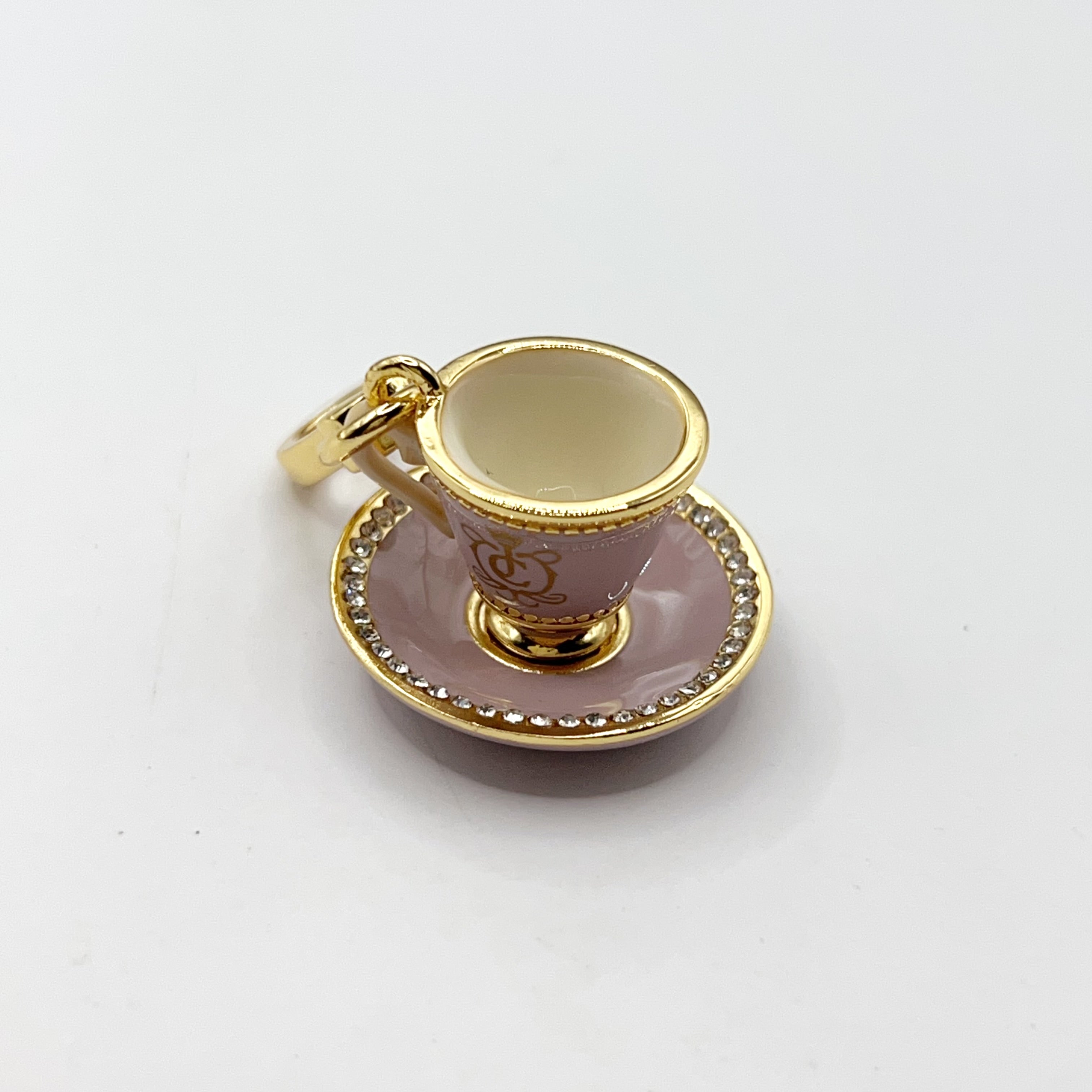 O06-Juicy Couture pink teacup charm