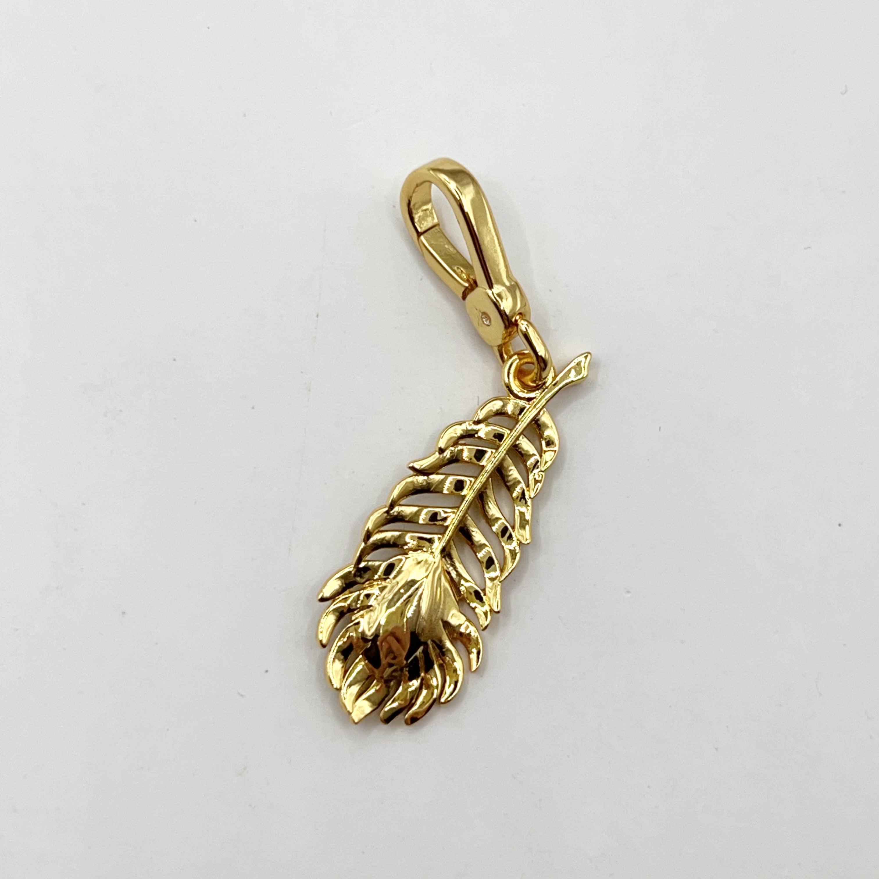 H12-Juicy Couture peacock feather charm